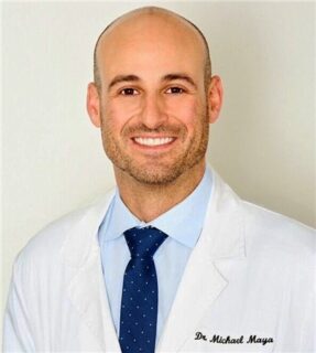 Dr. Michael Maya, Haratz Dental dentist, professional headshot